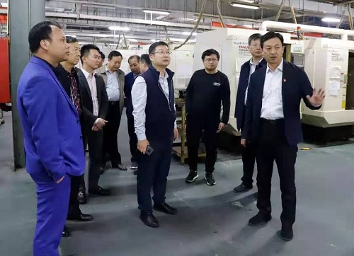 林鸿嘉会见深圳市雄毅华绝缘材料有限公司董事长吴财坤一行1.jpg