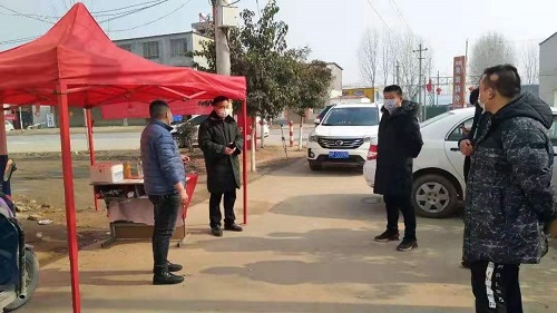 西华县大王庄乡用行动将党旗插在疫情防控最前线1.jpg